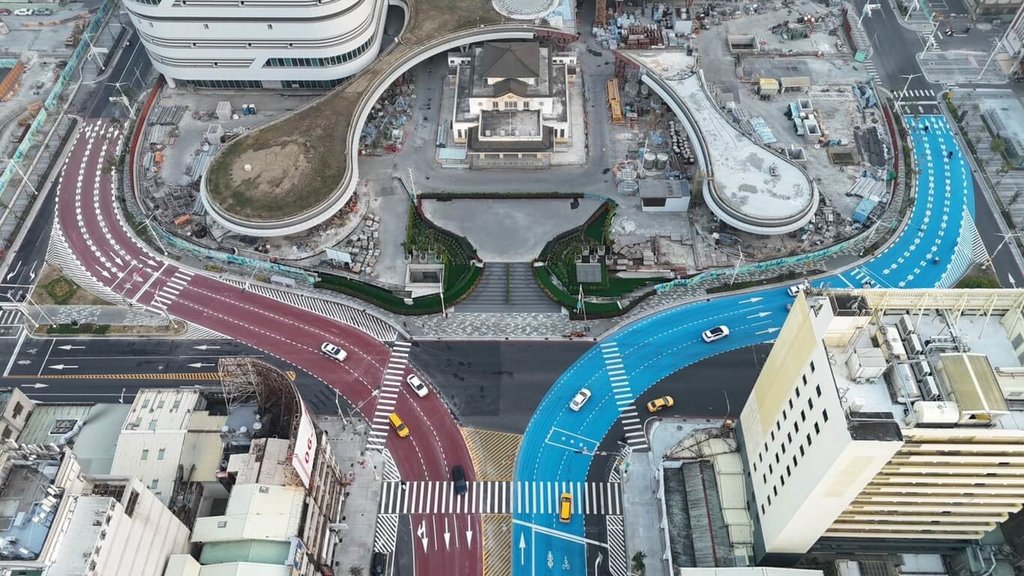 Colored pavement area outside Kaohsiung Station after an earlier construction milestone.