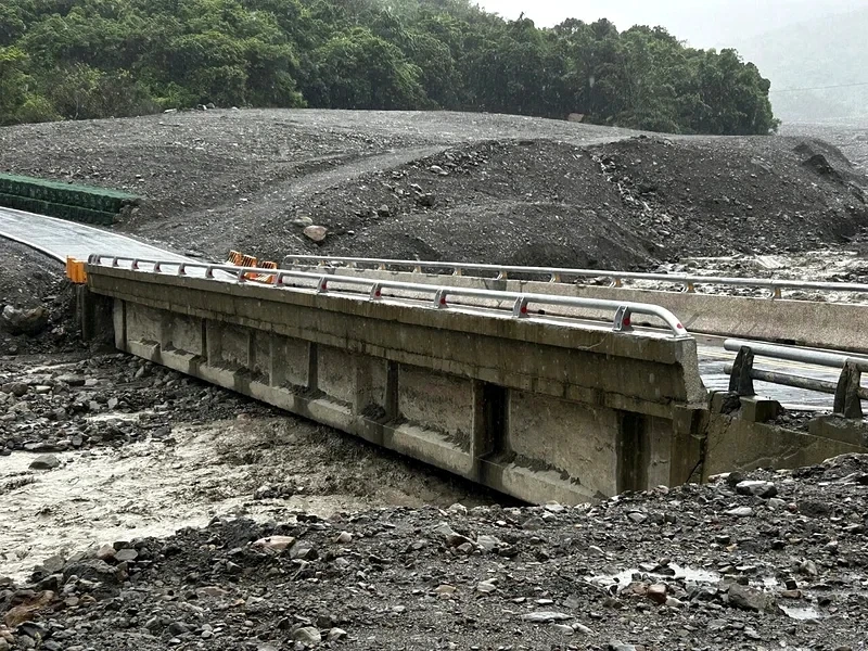 Sediment surrounding a bridge in Jiasian District after heavy rain