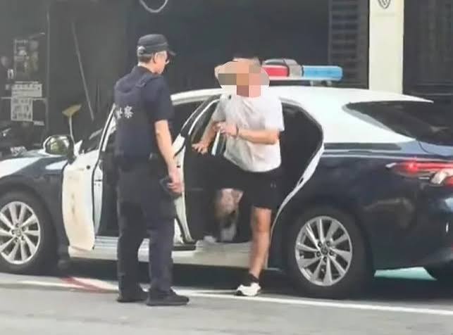 Man climbs into police car for a laugh; prank earns him a return invitation