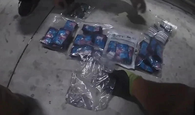 Packets displayed on a floor during a Kaohsiung police drug raid